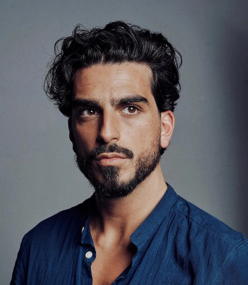 Dugi quiff frizura za muškarce s dijamantnim oblikom lica koja dodaje volumen i omekšava užu bradu.