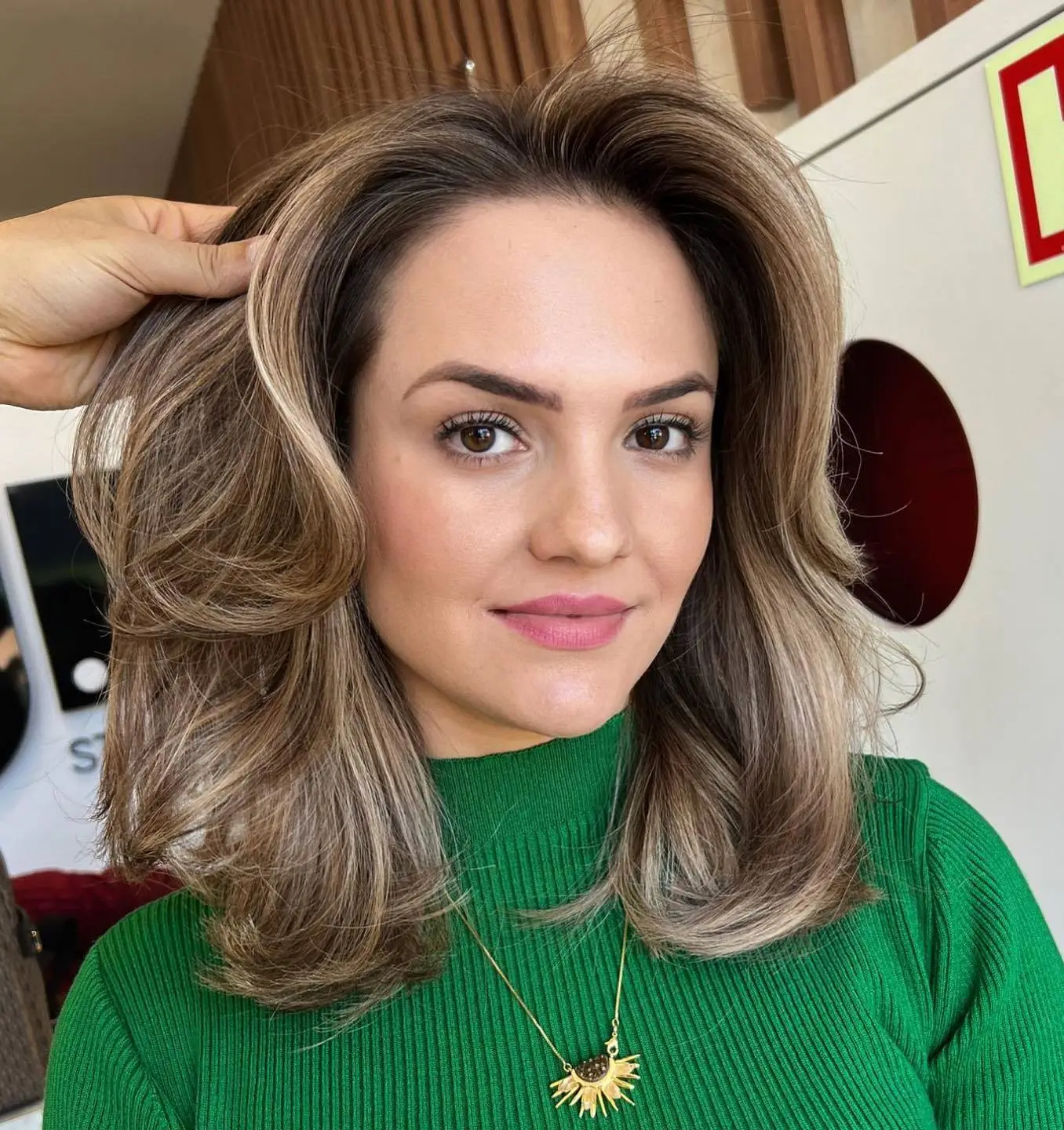 Voluminozni paž do ramena koji dodaje punoću i omekšava crte trokutastog lica.